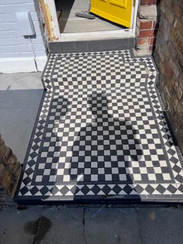 Optical Elegance: Checkered Entryway